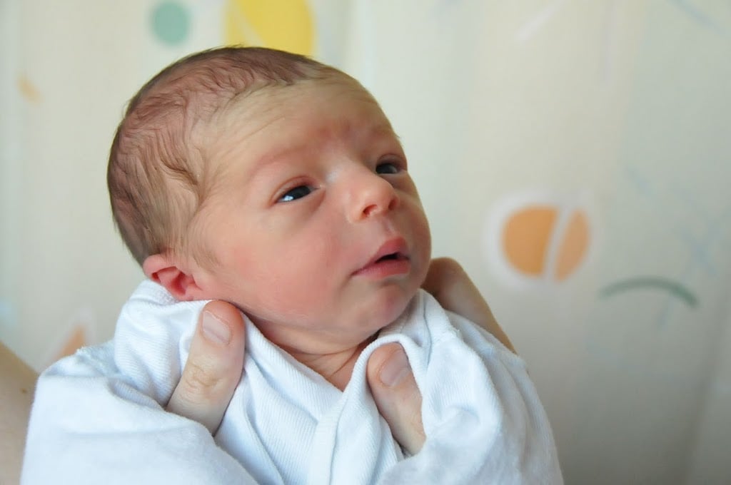 cute baby boy with blue eyes and brown hair