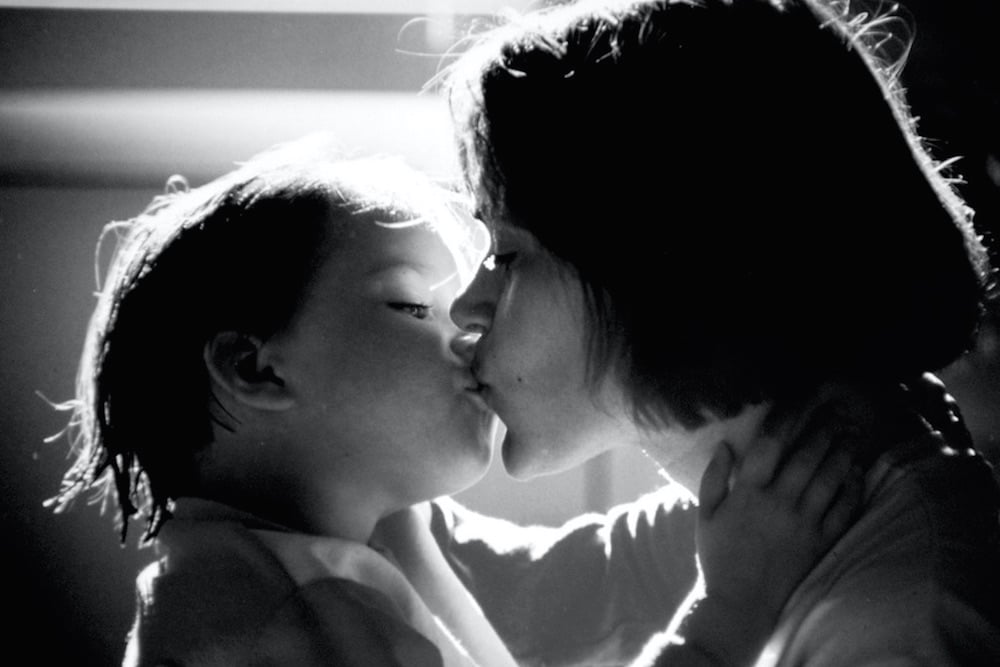 children kissing on the lips