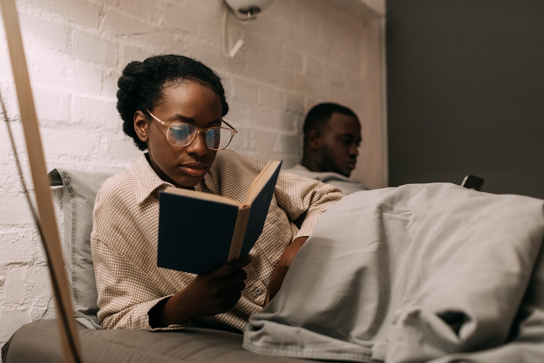 couple reading in bed