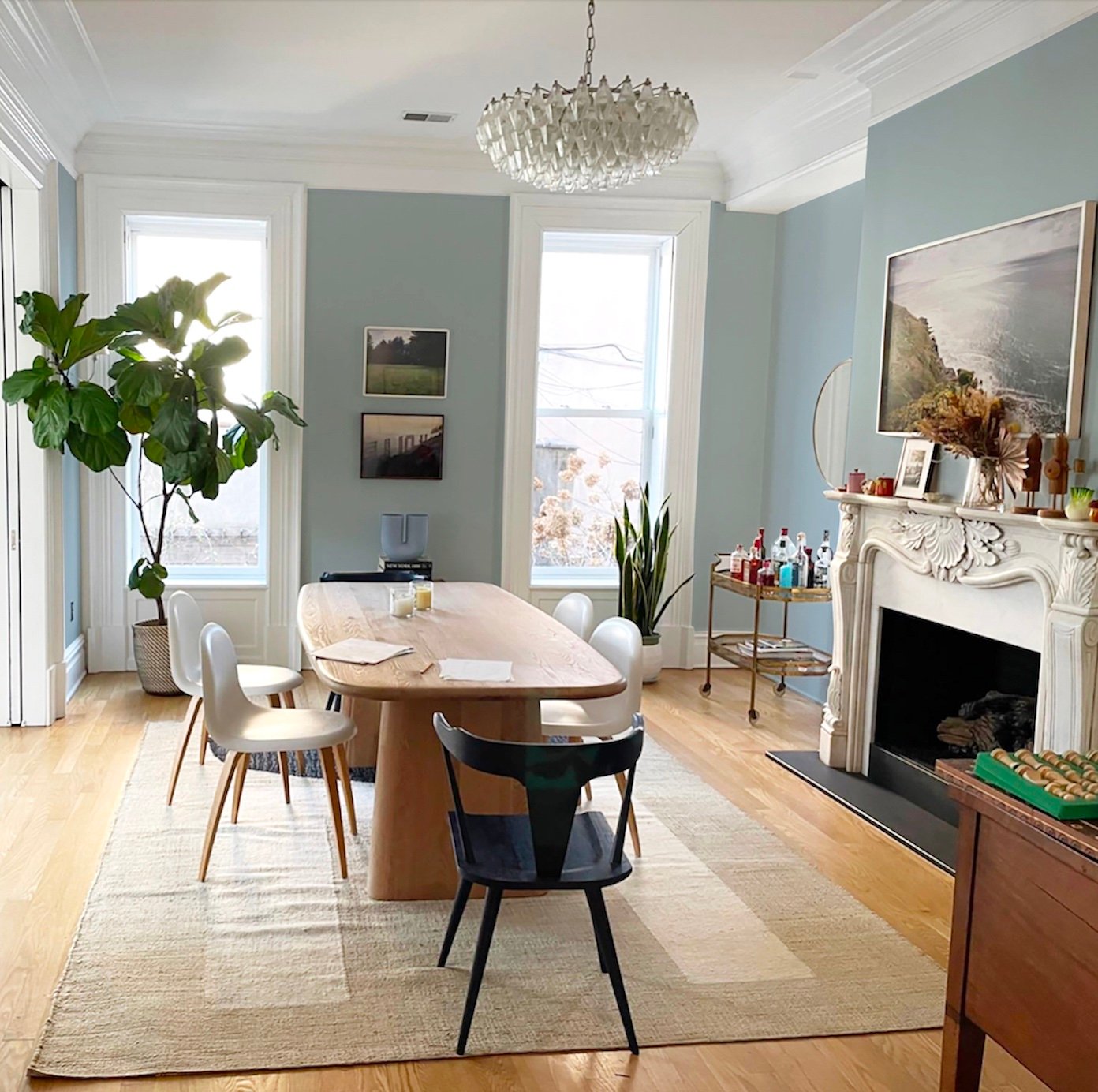 Joanna goddard dining room blue paint bookcases