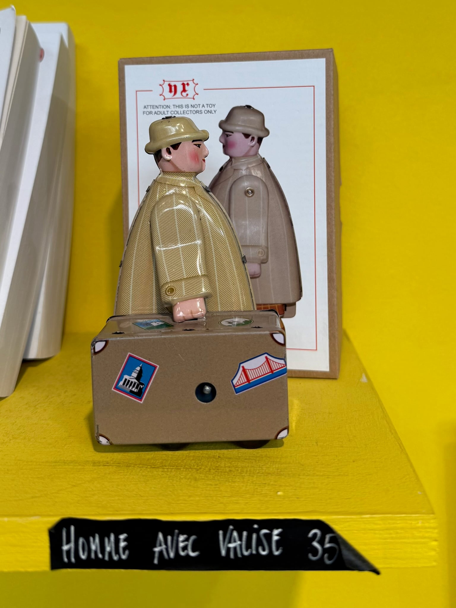 merci toy man with suitcase