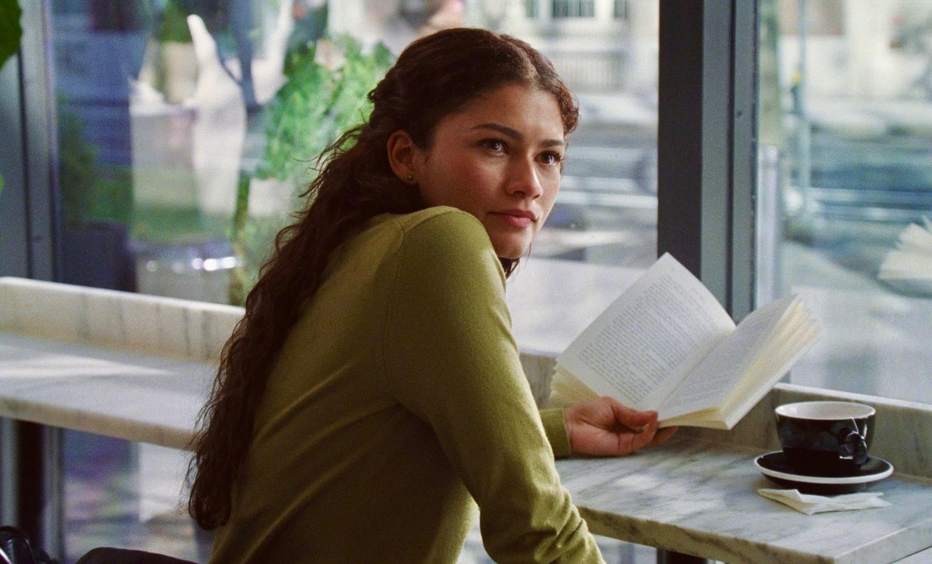 Zendaya reading book scene in The Drama